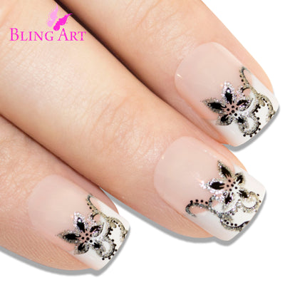 Black-and-white flower-tip French manicure press-on false nails by Bling Art — playful floral statement for summer, festivals, and feminine looks · printed flower design with French tip · medium-length tips · 24 nails per set with adhesive · designed in Yorkshire