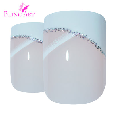 White glitter French manicure Bling Art press-on nails — worn-hand close-up showing the white sparkle French tip on medium-length tips.