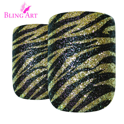 Gold and black French manicure press-on false nails by Bling Art — bold metallic twist on the classic French look for parties and statement events · high-shine finish with gold-and-black French tip · medium-length tips · 24 nails per set with adhesive · designed in Yorkshire