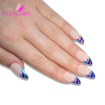 Blue glitter almond stiletto Bling Art press-on nails — worn-hand close-up showing the vibrant blue sparkle on long pointed almond stiletto tips. Almond = Stiletto (same shape).