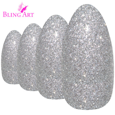 Cool chrome silver gel almond stiletto long press-on false nails by Bling Art — sleek metallic gloss for parties, Christmas, and editorial events · glossy salon-grade gel coat · long almond stiletto tips · 24 nails per set with adhesive · designed in Yorkshire