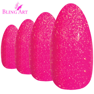 Pink gel almond stiletto Bling Art press-on nails — worn-hand close-up showing the fuchsia-pink gel coat on long pointed almond stiletto tips. Almond = Stiletto (same shape).