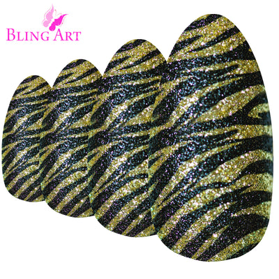 Two-tone champagne gold and jet black almond stiletto long press-on false nails by Bling Art — luxe metallic statement for parties, weddings, and Christmas events · high-shine finish · long almond stiletto tips · 24 nails per set with adhesive · designed in Yorkshire