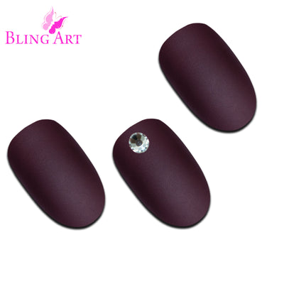 Red Brown matte oval press-on nails by Bling Art — close-up showing the velvet matte texture and warm chestnut tone on medium-length oval tips, ideal for autumnal wear and everyday styling, designed in Yorkshire UK.