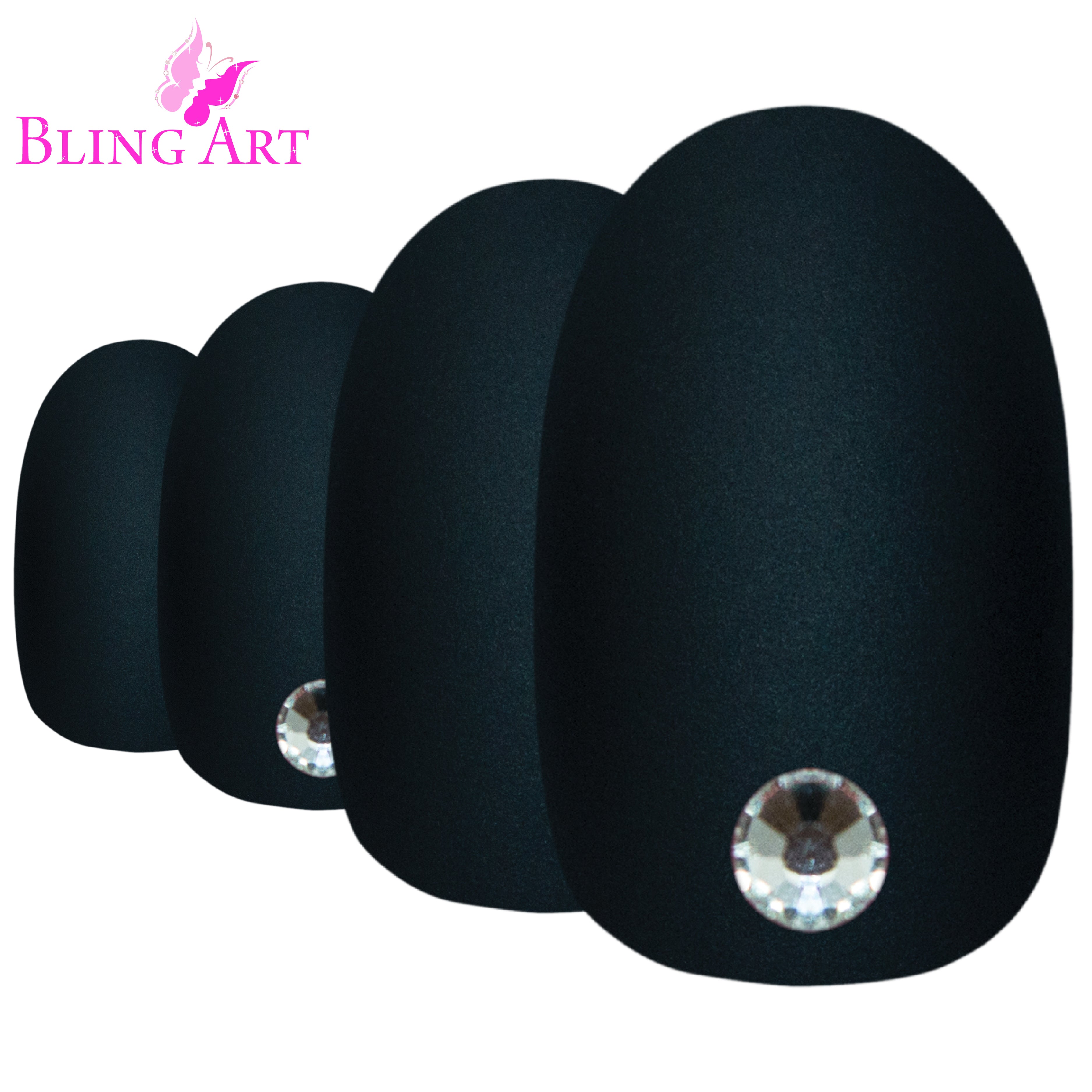 Black matte oval press-on nails by Bling Art — worn-hand close-up showing the velvet matte texture on medium-length oval tips.