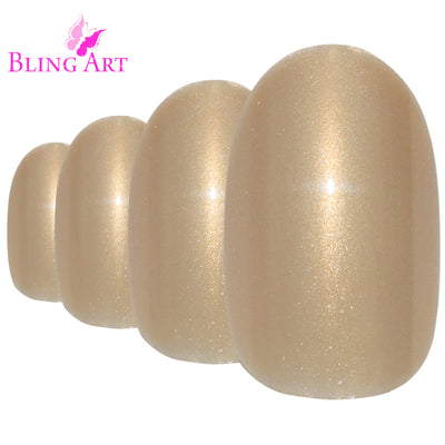 Warm champagne gold glitter-finish oval-shaped press-on false nails by Bling Art — celebration-ready sparkle for weddings, Christmas, and special occasions · embedded fine glitter sparkle · medium-length oval tips · 24 nails per set with adhesive · designed in Yorkshire