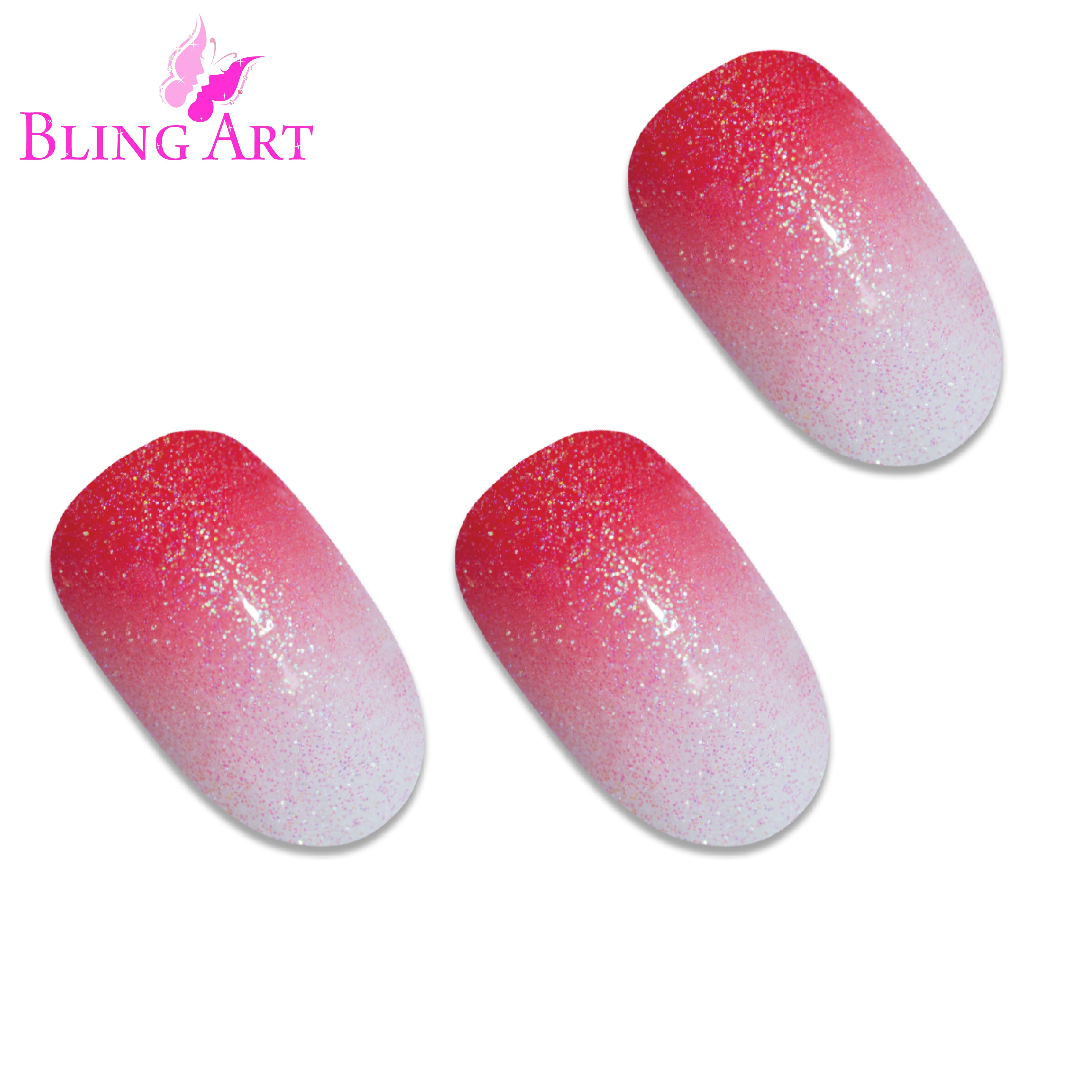Red gel ombre oval press-on nails by Bling Art — worn-hand close-up showing the crimson-to-clear gradient on medium-length oval tips.