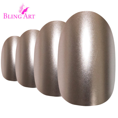 Beige matte metallic oval Bling Art press-on nails — worn-hand close-up showing warm-beige chrome with velvet matte texture on oval tips.