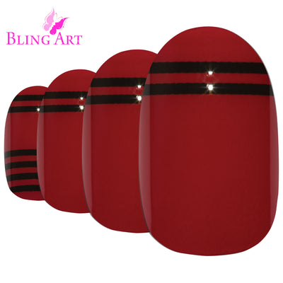 Two-tone crimson red and jet black glossy oval-shaped press-on false nails by Bling Art — bold rock-romantic statement for parties and date nights · high-shine glossy finish · medium-length oval tips · 24 nails per set with adhesive · designed in Yorkshire