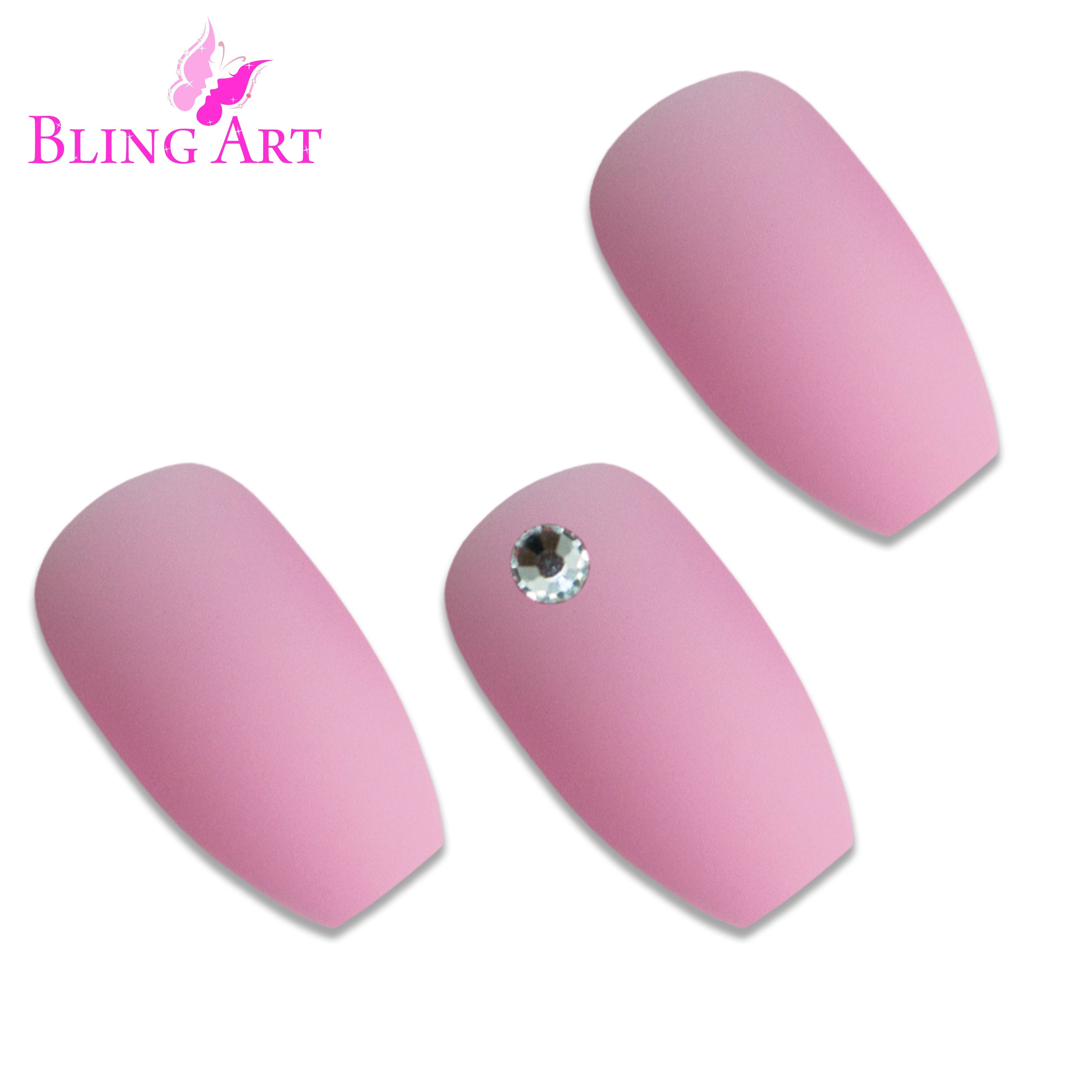 Pink matte ballerina coffin Bling Art press-on nails — worn-hand close-up showing the blush-pink velvet matte on long ballerina coffin tips. Ballerina = Coffin (same shape).
