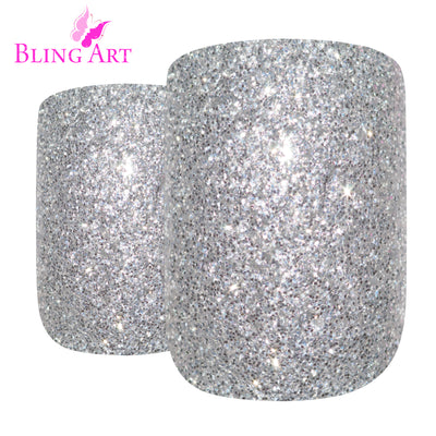 Cool chrome silver gel French squoval press-on false nails by Bling Art — sleek metallic glamour for parties, Christmas events, and editorial looks · glossy salon-grade gel coat with French tip · medium-length squoval tips · 24 nails per set with adhesive · designed in Yorkshire