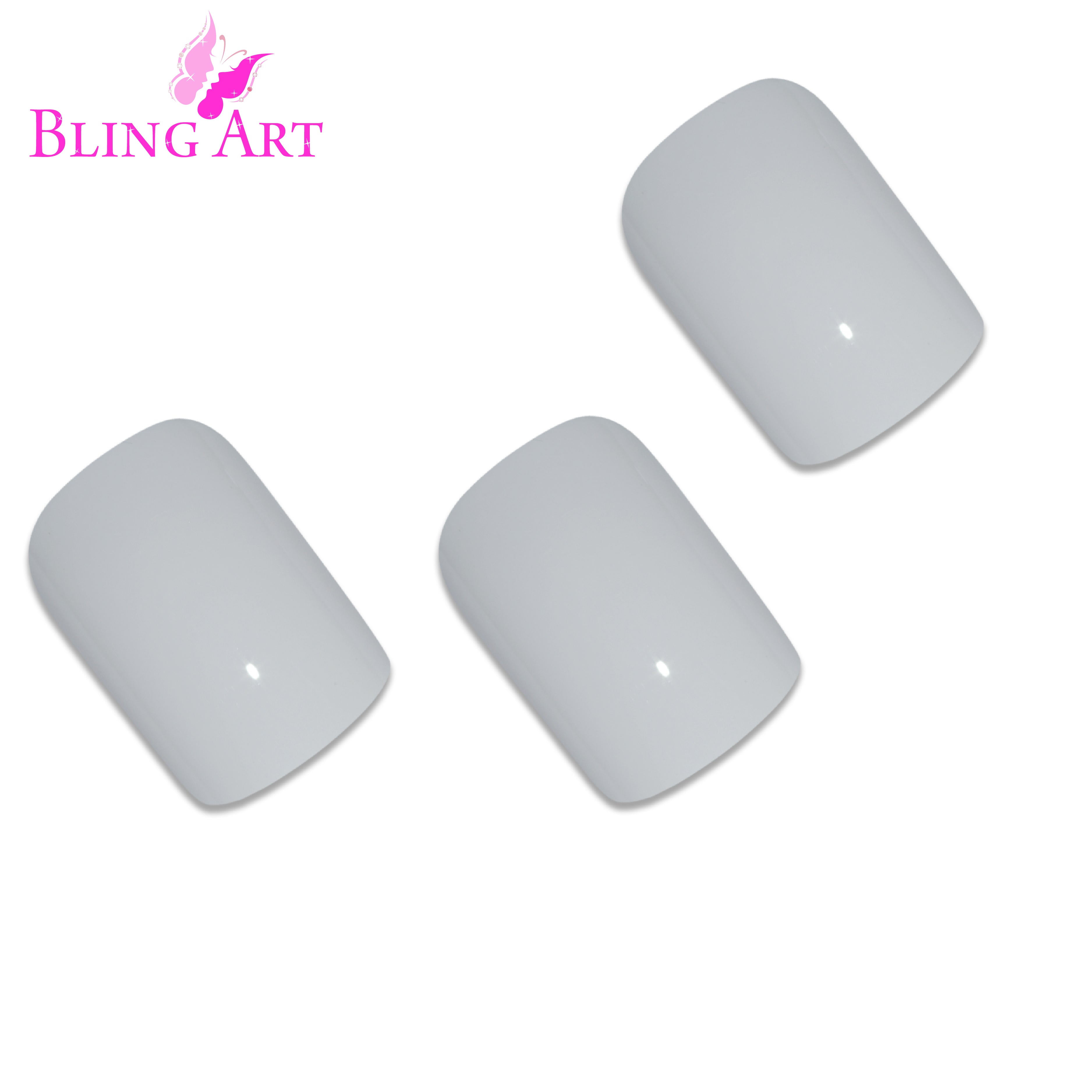 White polished French squoval Bling Art press-on nails — worn-hand close-up showing the crisp pearl-white French tip on squoval tips.
