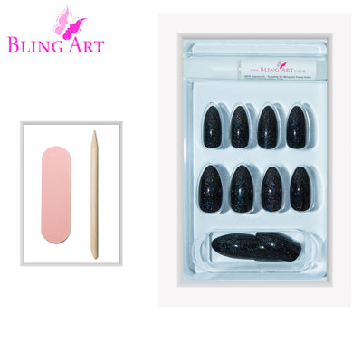 Black gel almond stiletto long press-on false nails by Bling Art — deep jet-black high-shine gel for evening wear, editorial styling and statement looks. 24 nails, 12 sizes XS-XXL, no UV lamp. Designed in Yorkshire UK. Almond = Stiletto (same shape).