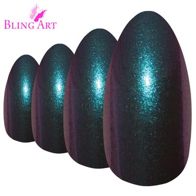 Colour-shifting green-purple chameleon almond stiletto long press-on false nails by Bling Art — bold trend-led statement for festivals, parties, and editorial looks · colour-shifting chameleon effect · long almond stiletto tips · 24 nails per set with adhesive · designed in Yorkshire