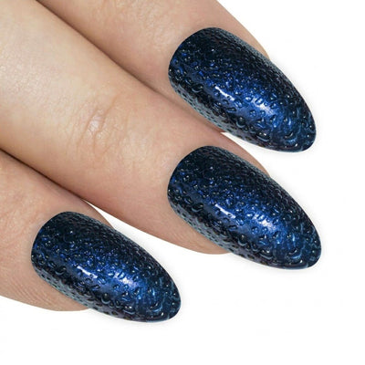 Bling Art press-on nails worn on a hand