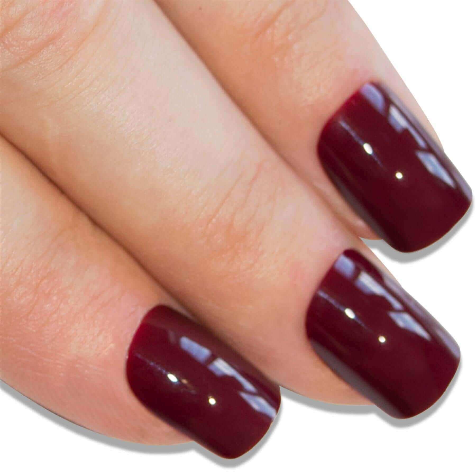 Multipack - False Nails by Bling Art Brown Red French Manicure Fake Medium Tips with Glue displayed on manicured hands.