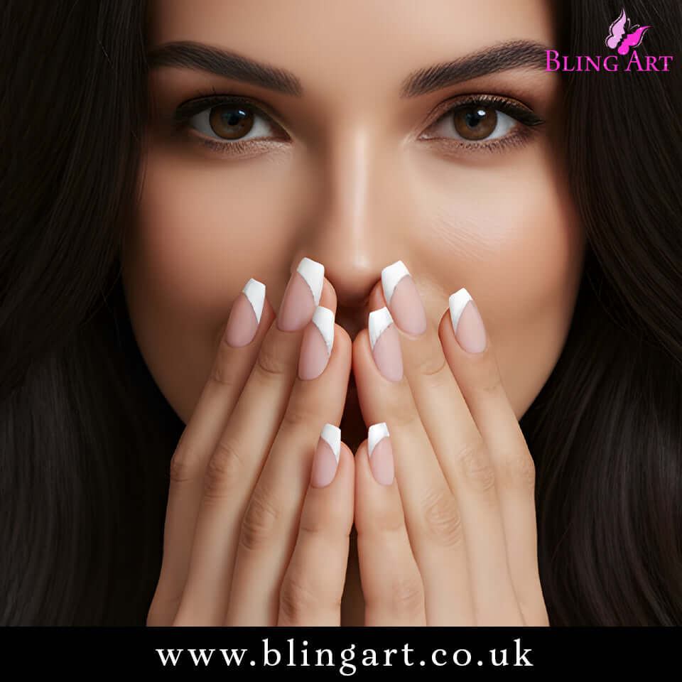 Multipack - False Nails by Bling Art White Polished Ballerina Coffin Fake French Nail Tips on manicured fingers.