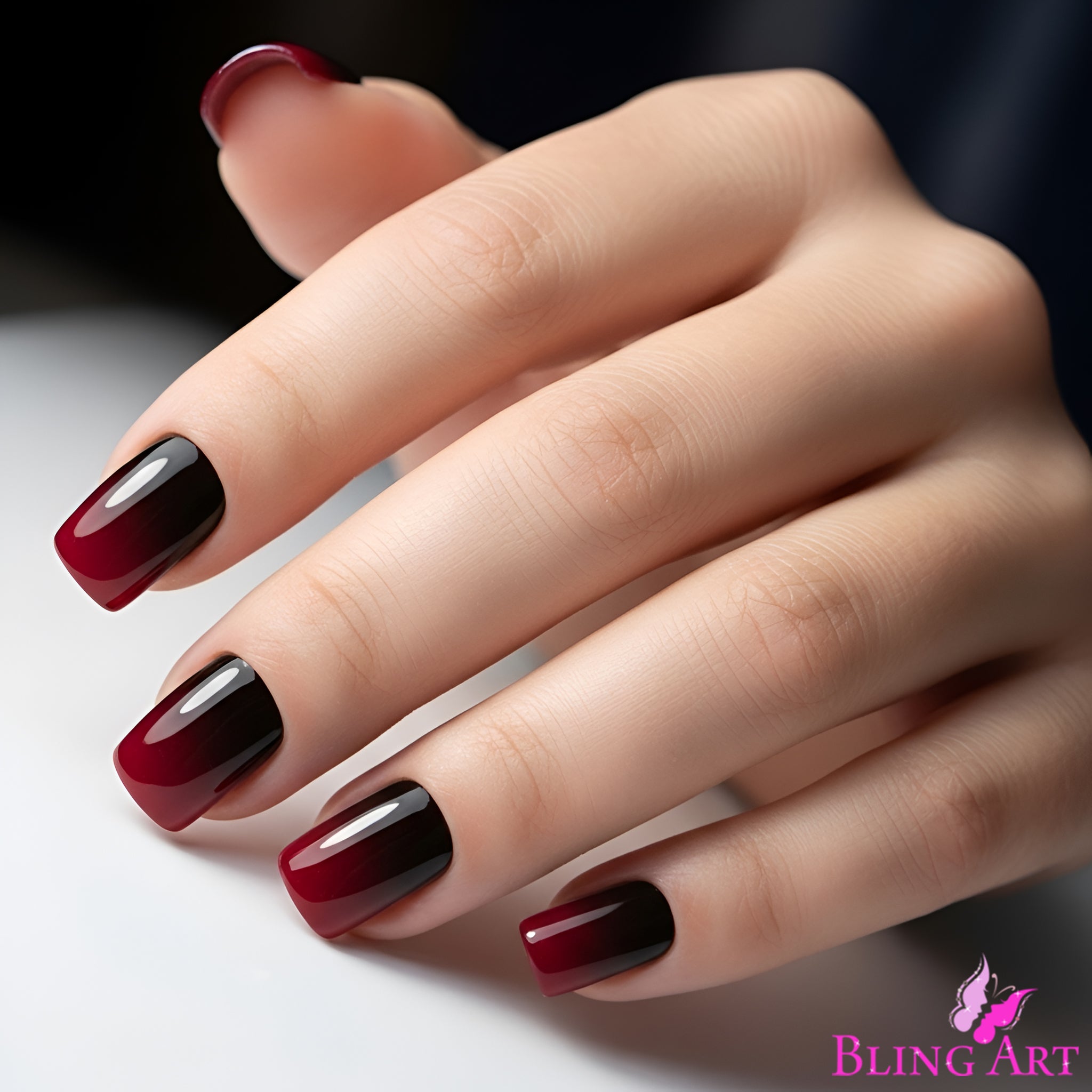 Multipack - False Nails by Bling Art Red Black French Squoval 24 Fake Medium Acrylic Tips displayed on manicured fingers.