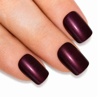 Brown glitter French squoval Bling Art press-on nails — worn-hand close-up showing the chocolate-brown sparkle French tip on squoval tips.