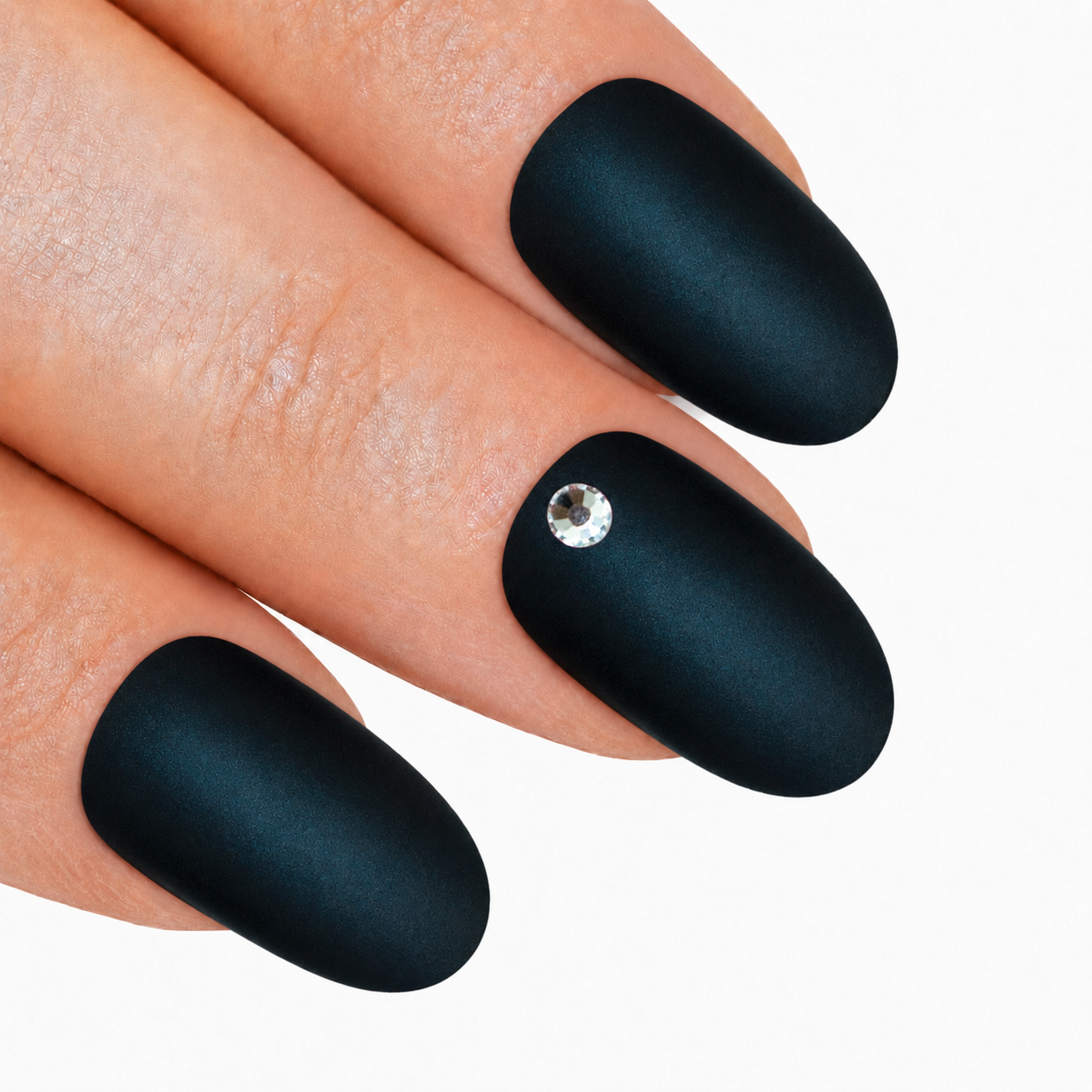 Black matte oval press-on false nails by Bling Art — deep jet-black velvet matte for edgy everyday wear and modern statement looks. 24 nails, 12 sizes XS-XXL, no UV lamp. Designed in Yorkshire UK.