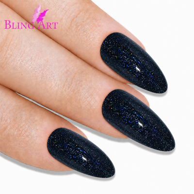 Black gel almond stiletto long press-on false nails by Bling Art — deep jet-black high-shine gel for evening wear, editorial styling and statement looks. 24 nails, 12 sizes XS-XXL, no UV lamp. Designed in Yorkshire UK. Almond = Stiletto (same shape).