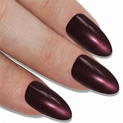 Brown glitter almond stiletto Bling Art press-on nails — worn-hand close-up showing the chocolate-brown sparkle on long pointed almond stiletto tips. Almond = Stiletto (same shape).