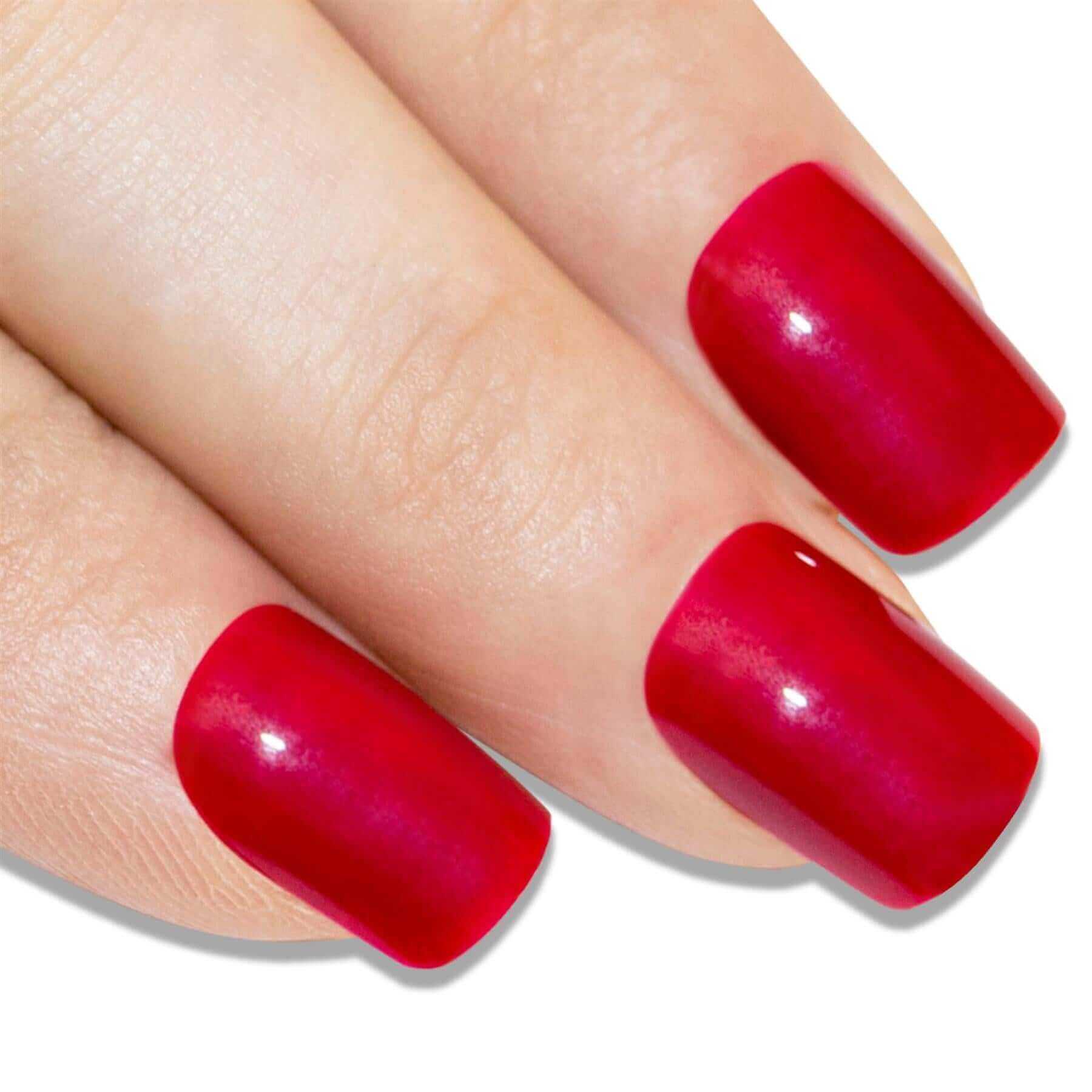 Multipack - False Nails by Bling Art Red Polished French Manicure Fake Medium Tips with Glue on fingers.