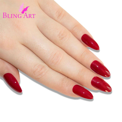 Red Polished Almond press-on false nails by Bling Art — 24 long tips, salon-quality finish, no UV needed.