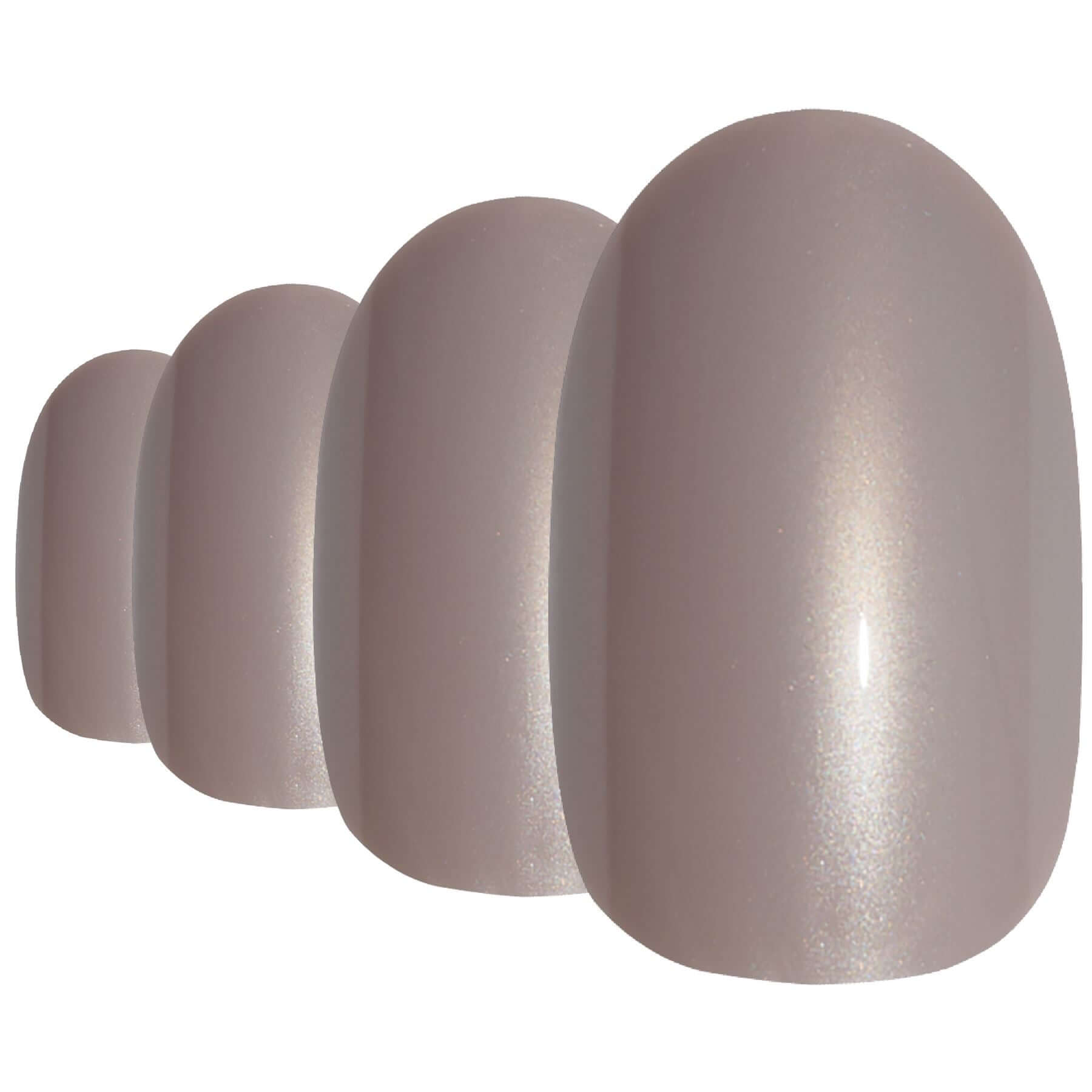 Soft warm-beige glitter-finish oval-shaped press-on false nails by Bling Art — soft sparkle for weddings, romantic occasions, and elegant evenings · embedded fine glitter sparkle · medium-length oval tips · 24 nails per set with adhesive · designed in Yorkshire