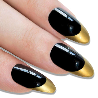 Two-tone jet black and champagne gold almond stiletto long press-on false nails by Bling Art — luxe statement for parties, weddings, and Christmas events · high-shine finish · long almond stiletto tips · 24 nails per set with adhesive · designed in Yorkshire