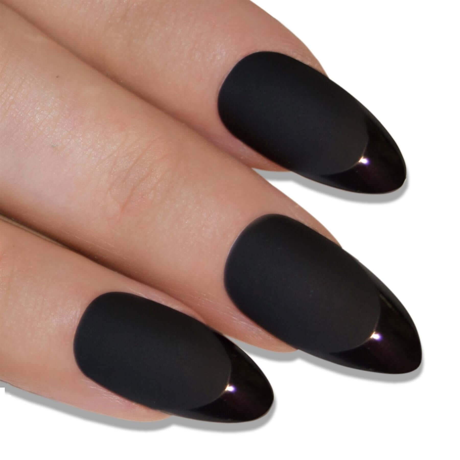 Deep jet black matte almond stiletto long press-on false nails by Bling Art — modern edgy bold-length statement for evening wear and editorial styling · smooth velvet matte texture · long almond stiletto tips · 24 nails per set with adhesive · designed in Yorkshire