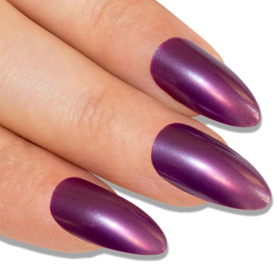Rich plum-purple high-polish almond stiletto long press-on false nails by Bling Art — jewel-tone bold-length statement for evening wear and special occasions · high-shine polished finish · long almond stiletto tips · 24 nails per set with adhesive · designed in Yorkshire