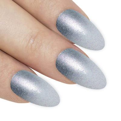 Cool chrome silver gel-ombre almond stiletto long press-on false nails by Bling Art — sleek metallic gradient for parties, Christmas, and editorial looks · smooth silver-to-clear ombre transition with glossy gel coat · long almond stiletto tips · 24 nails per set with adhesive · designed in Yorkshire